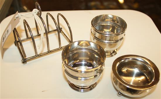 Silver toast rack, 2 egg cups and salt